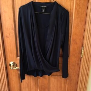 White House Black Market navy blue wrap top in size S.